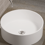 es un lavabo sobre encimera solid surface de zenon, circular , se puede hacer en diferentes colores