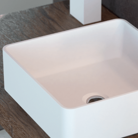 es un lavabo sobre encimera cuadrada de solid surface, se puede hacer en distintos colores